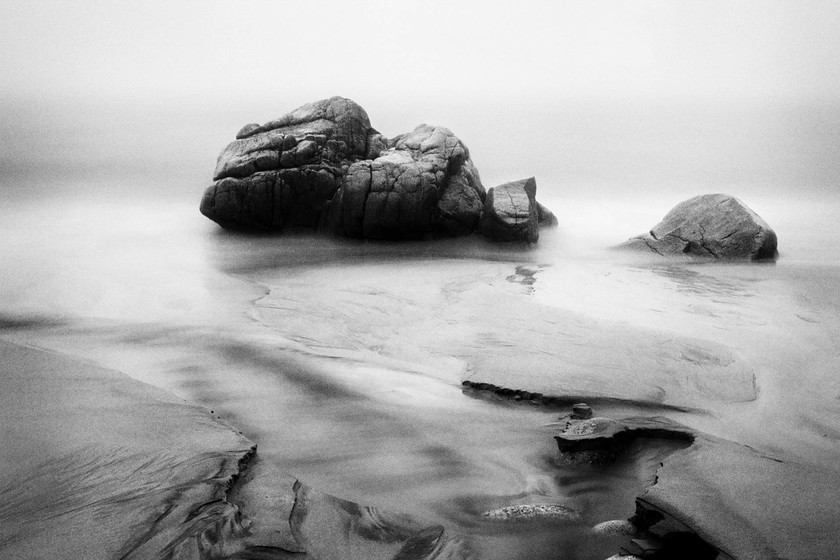 Bubblegum rock at Porth Nanven in mono