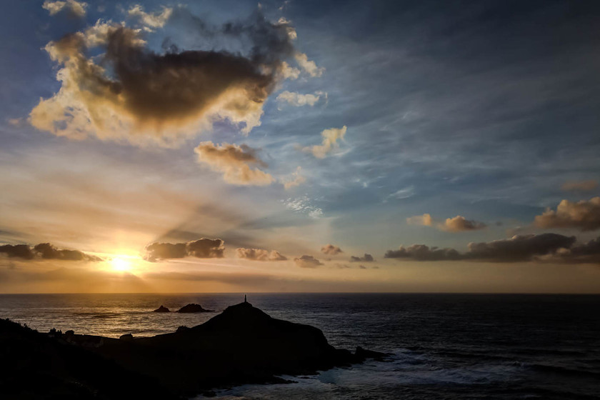 Sunset over Cape Cornwall and the Brisons