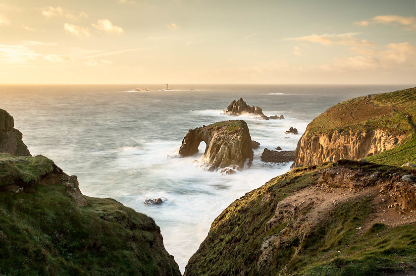 Lands End Sea Arch and Longships Lighthouse